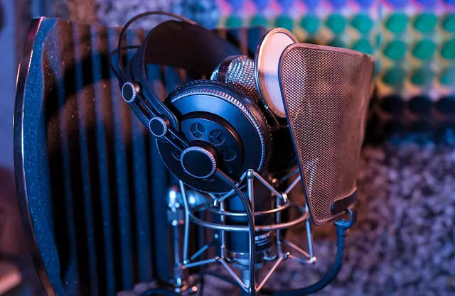 Studio headphones, microphone and pop filter